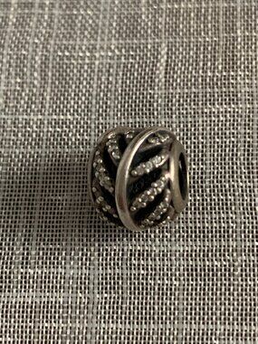 Pandora Retired Light as a Feather Silver and CZ charm